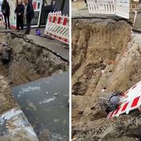 У Києві бабуся провалилася в гігантську яму, покинуту комунальниками (відео)